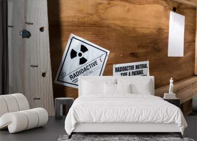 Radiation label beside the transport wooden box Type A package Wall mural