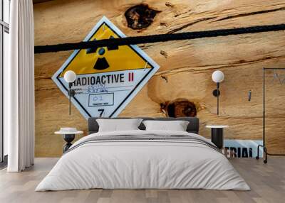 Radiation label beside the transport wooden box Type A package Wall mural