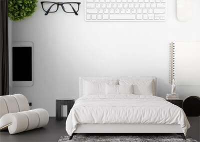 White hipster office desk table with computer gadgets, and supplies. Top view with copy space, flat lay. Wall mural