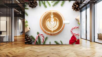 White marble table with cup of latte coffee and Christmas decoration with gift box. Christmas and new year celebration concept. Top view with copy space, flat lay. Wall mural