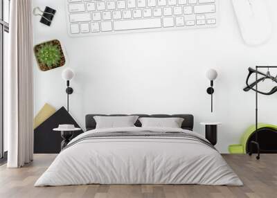 White office desk table with computer gadgets and office supplies. Top view with copy space, flat lay. Wall mural