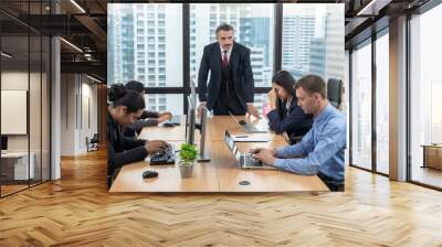 Moody boss complaining team about the mistake. Businessman managers pointing out mistakes and looking to their team. Toxic work environment concept Wall mural