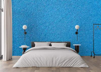 Texture of fake blue grass for background or backdrop. Wall mural