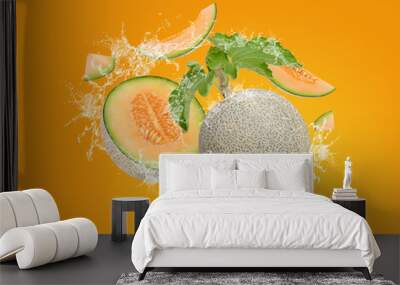 Water Splash On fresh Cantaloupe With Leaves Isolated On Yellow Background Wall mural