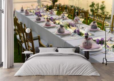 Table setting at a luxury wedding and Beautiful flowers on the table. Wall mural