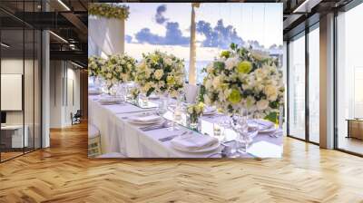 Table setting at a luxury wedding and Beautiful flowers on the table. Wall mural