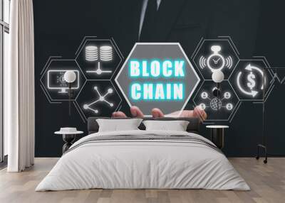 Blockchain technology concept, Businessman hand holding blockchain icon on virtual screen, Fintech concept with encrypted ledger blocks chained. Wall mural