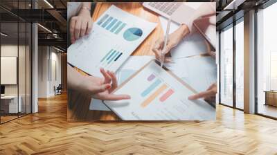 Group of business people analysis summary graph reports of business operating expenses and work data about the company's financial statements. Wall mural