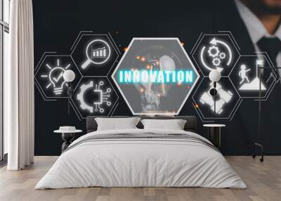 Innovation concept, Businessman hand holding light bulb with innovation icon on virtual screen. Wall mural