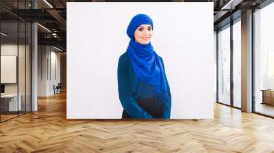 Attractive muslim woman on white background Wall mural