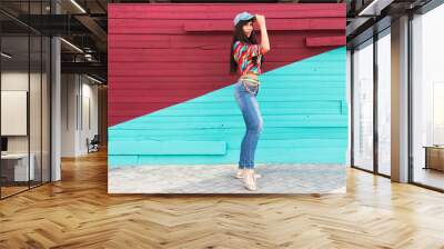 Happiness and craziness. Smiling funny girl have fun outdoor and dances. Young attractive woman with long hair posing outdoor Wall mural