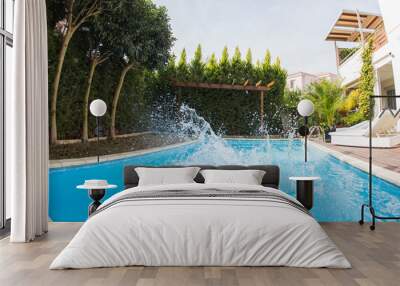 Splashing water in pool Wall mural