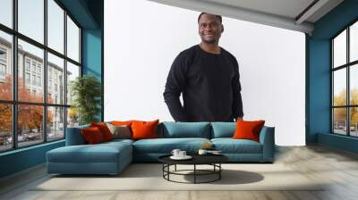 Street fashion concept - Studio shot of young handsome African man wearing sweatshirt against white background. Wall mural