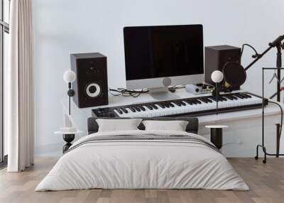 Synthesizer keyboard digital recording and guitars, home music record studio concept. Leisure and hobby concept. Wall mural