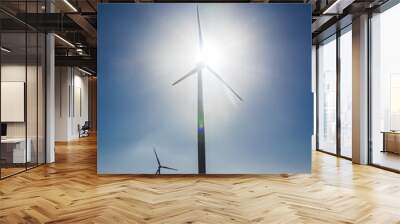 Wind turbines generating electricity with blue sky - energy conservation concept Wall mural