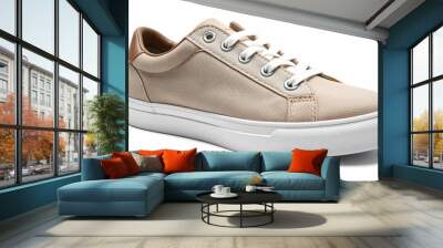 A stylish beige canvas sneaker with a white sole showcases a modern and versatile design suitable for various occasions. Perfect for casual wear and everyday outings Wall mural