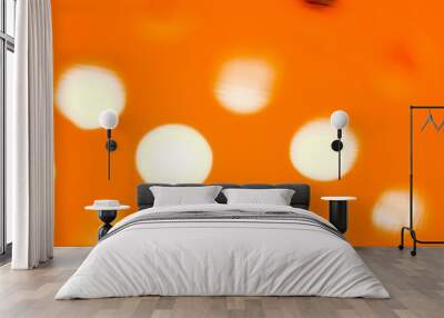 Abstract blurred orange background with white circles Wall mural