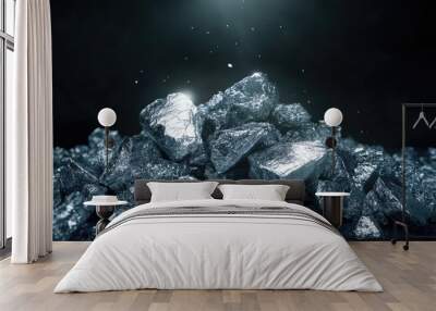 A pile of raw silver nuggets, shining under bright light, against a dark backdrop. Wall mural