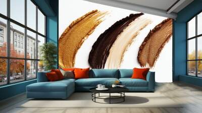 Beige, brown, and gold eyeshadow smears arranged on a white background, showcasing the texture and rich pigments of each shade Wall mural