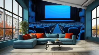 Blue screen at the back of an empty auditorium, seats neatly arranged, stage ready for action Wall mural