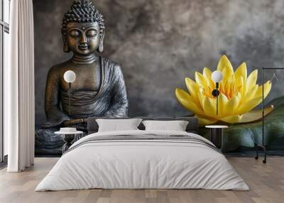 Buddha statue in meditation, accompanied by a yellow lotus flower, against a simple, calming background. Wall mural