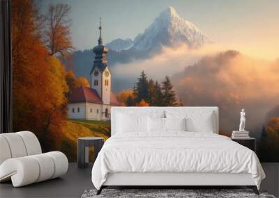 Iconic view of Maria Gern Church with the Hochkalter Peak in the background, autumn colors illuminating the Bavarian landscape at sunrise Wall mural