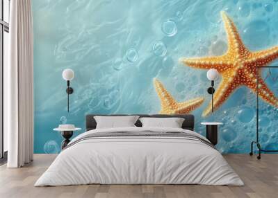 Starfish and bubbles on a light blue background, creating a calm and peaceful oceanic scene Wall mural