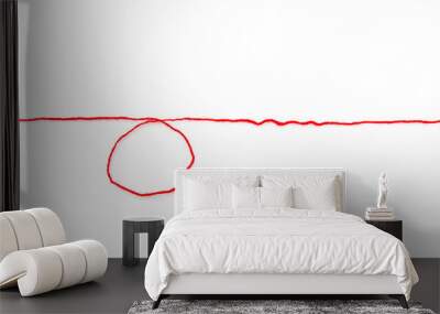 Line of red yarn, long red thread with a knot isolated on white background Wall mural