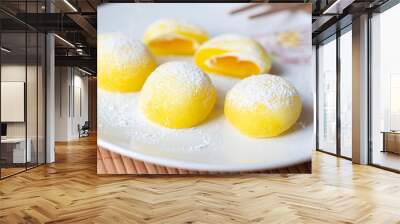 Mochi on a white plate. Yellow rice dessert, mochi is mostly Japanese traditional sweet food Wall mural