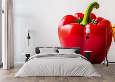 A vibrant red bell pepper and a bright yellow bell pepper sit side-by-side on a pristine white background, showcasing the colors of fresh produce and the simplicity of nature. Wall mural