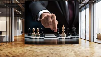 Closeup of businessman playing chess.  Wall mural