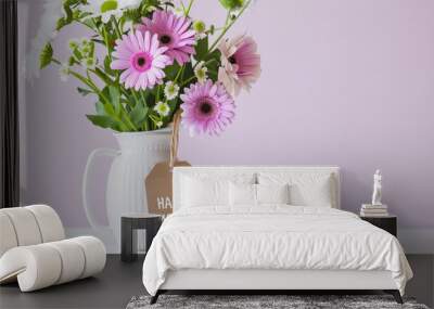 Pastel purple flowers in white vase with Happy Mothers Day swing tag on table empty background for beautiful fresh floral bouquet thanks mom design concept blank stylish chic feminine mum copy space Wall mural