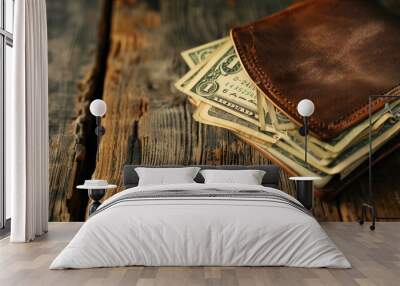 A close-up shot of a brown leather wallet that is full of green dollar bills.
 Wall mural