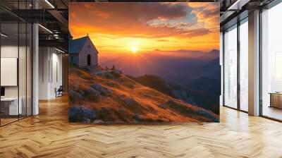 The church on the mountaintop is shown in the glow of the morning sun as it rises over the horizon. Wall mural