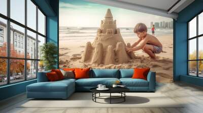 children build a sand castle against the background of the ocean  Wall mural