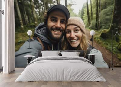 a cute romantic hetrosexual couple shooting a selfie while hiking in country in a forest in the morning. smiling and being happy together. Generative AI Wall mural