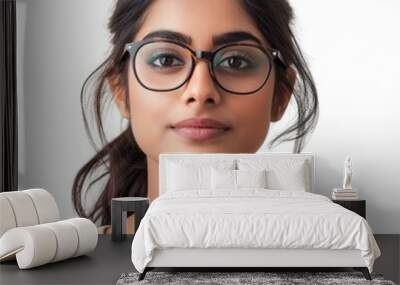 a face portrait of a beautiful young indian asian woman girl female with dark black hair wearing glasses. isolated on white studio background in square format. Wall mural