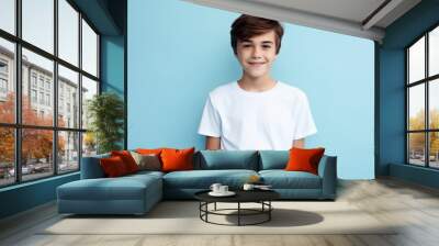 a photo of a young model kid boy with a blank white canvas t-shirt. pastel blue wall background. Generative AI Wall mural