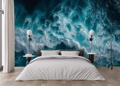 beautiful photo of blue water flowing in waves with white foam in a ocean. taken from up top above perspective. wallpaper background 16:9 Wall mural