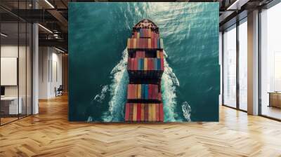 closeup overhead view of a cargo ship full of colorful containers transporting goods internationally worldwide swimming in ocean. wallpaper background for ads, web design, sites Wall mural