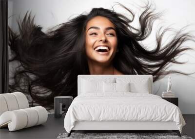 closeup photo portrait of a beautiful young asian indian female model woman shaking her beautiful hair in motion. ad for shampoo conditioner hair products. isolated on white background. Generative AI Wall mural