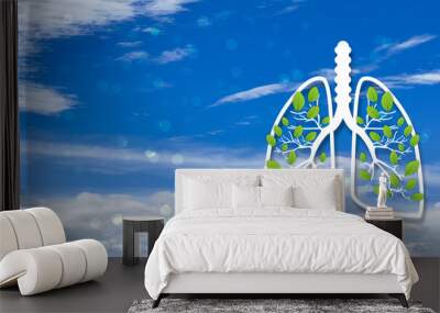 lung with leave concept image on blur blue sky background Wall mural