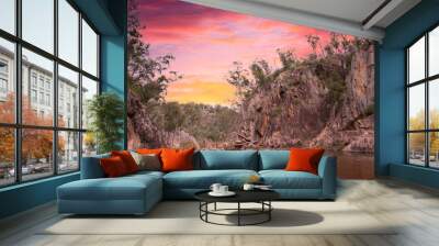 Pink sunset sky at Crows Nest Falls in Queensland, Australia in the natural bush area.  Wall mural