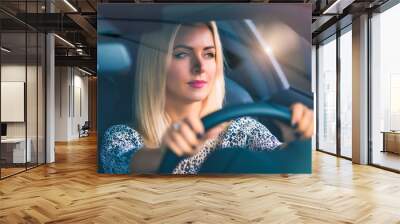 Young woman driving a car Wall mural