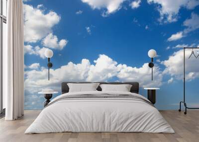 Blue sky background with tiny clouds Wall mural