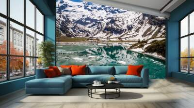 cracked frozen lake, mountains engelberg Wall mural