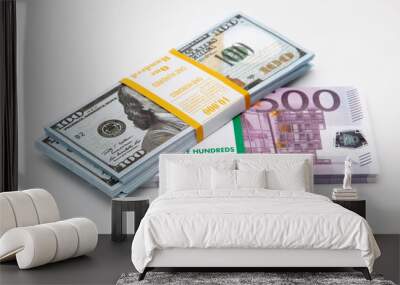 Bundle of dollars and euros on a white Wall mural