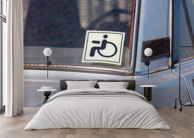 Disabled sign on car window Wall mural