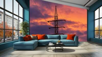 Electric pole with wires at sunset. Wall mural