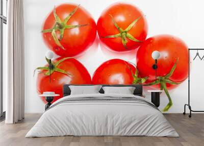 Five red tomatoes on a white background Wall mural